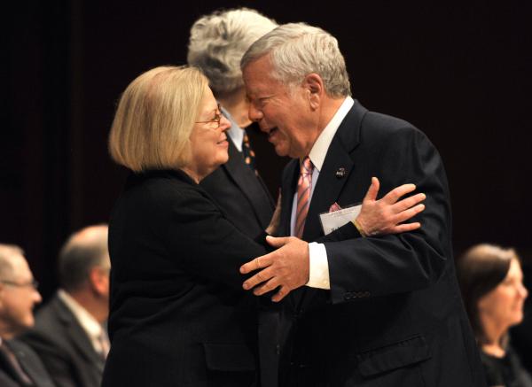 New England Patriots owner Robert Kraft, right, greets American Academy of Arts and Sciences, President Leslie Berlowitz, left.