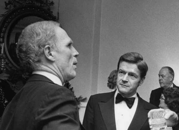 Former Boston University President John Silber, right, talks to former Boston Mayor Kevin White at a party in 1977.