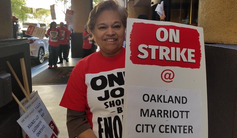 Hotel employee Blanca Smith joins the picket line outside the Oakland Marriott.