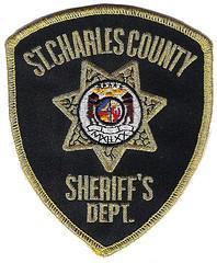 shooting st charles charged christmas fatal eve three bass pro county sheriff department been fourth lot badge arrested connection four