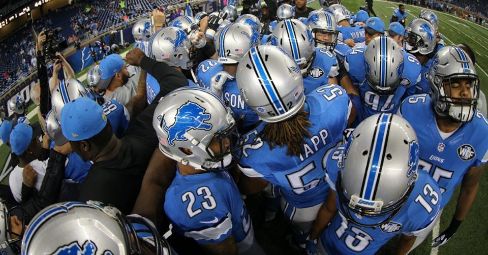 Detroit Lions link arms with coach and owner, as some ...