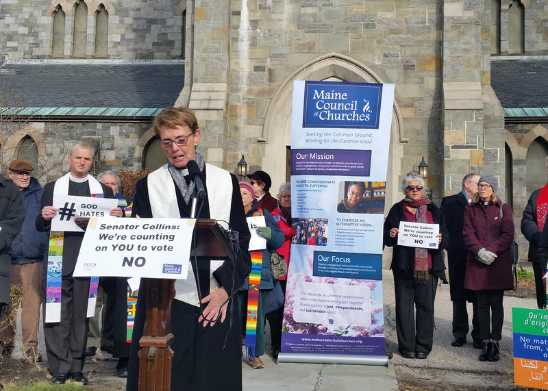 Rev. Carolyn Lambert of the Woodfords Congregational Church, UCC, at a rally Tuesday in Portland.