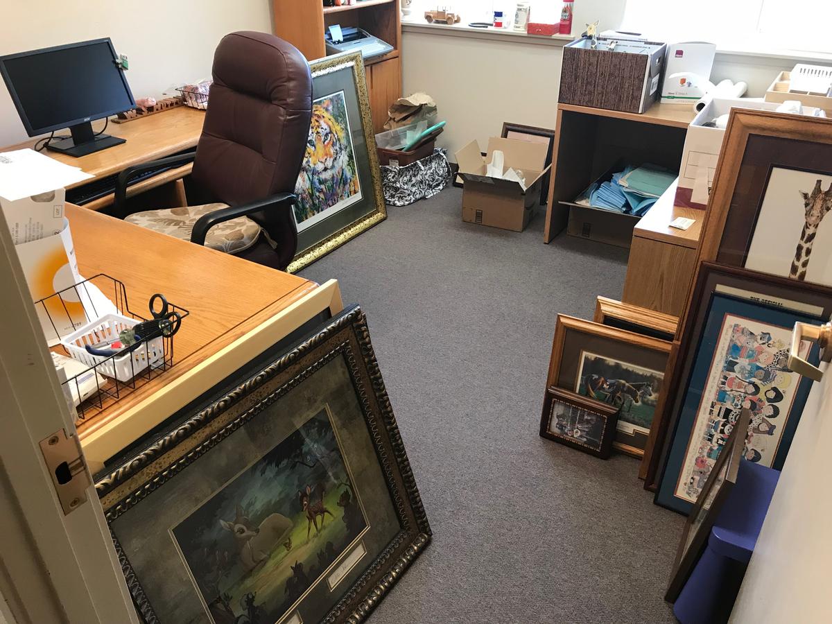 Paintings and office furniture wait to be cleared out of the closed pediatric practice of Dr. Steve Hutton in Aberdeen, Washington. CREDIT ENRIQUE PEREZ DE LA ROSA / NORTHWEST NEWS NETWORK