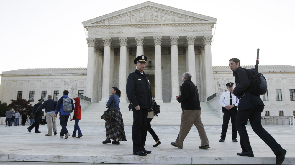 Supreme Court Justices Hear Opening Arguments Over Health Care Law ...
