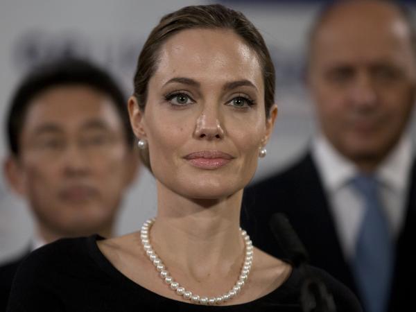 Angelina Jolie's decision to have a double mastectomy after genetic testing has prompted a discussion about which other tests should be covered.