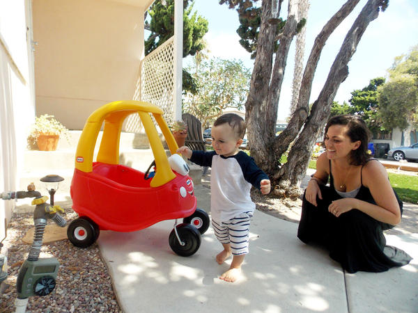 Kerri De Nies plays with her son, Gregory Mac Phee at their home in San Diego. Gregory tested positive for adrenoleukodystrophy, a rare brain disorder that affects 1 in about 18,000 babies. Roughly 30 percent of boys with the genetic mutation go on to develop the most serious form of the disease.