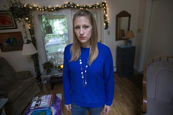 Julie Eldred is back at home in Massachusetts now. But she was sentenced to a treatment program for opioid addiction as part of a probation agreement, then sent to jail when she relapsed. Some addiction specialists say that's unjust.