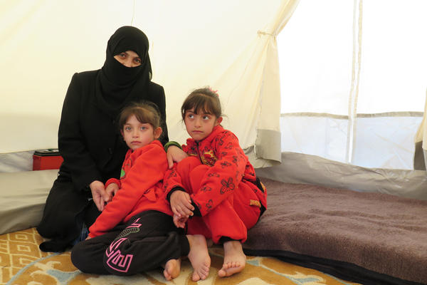Amani and her twin daughters Masa and Malaz at a camp for displaced persons in northern Syria after fleeing Douma, a town near Damascus, where they say they suffered a chlorine attack.