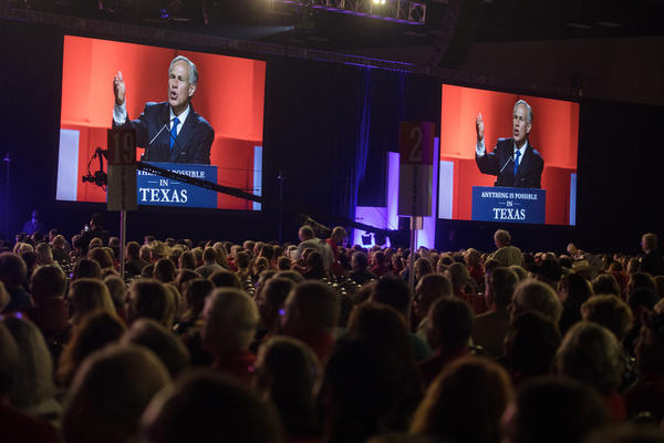 Gov. Greg Abbott addresses the crowd at the Texas GOP Convention in San Antonio on Friday.