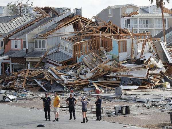 Rescue personnel search for people who may need help in Mexico Beach, Fla., on Thursday, one day after Hurricane Michael made landfall near the area.