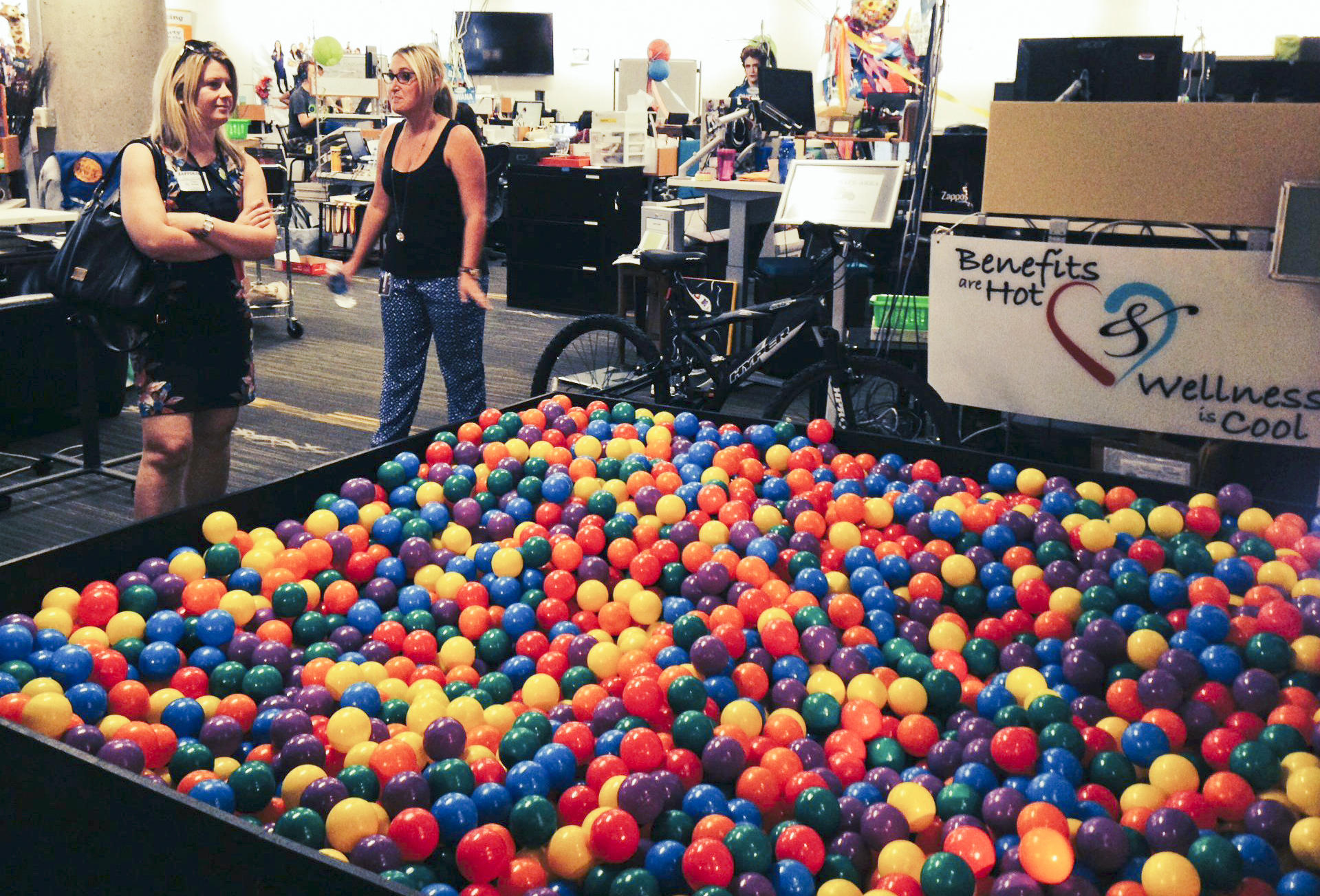(right) shows off the ball pit in the human resources department ...