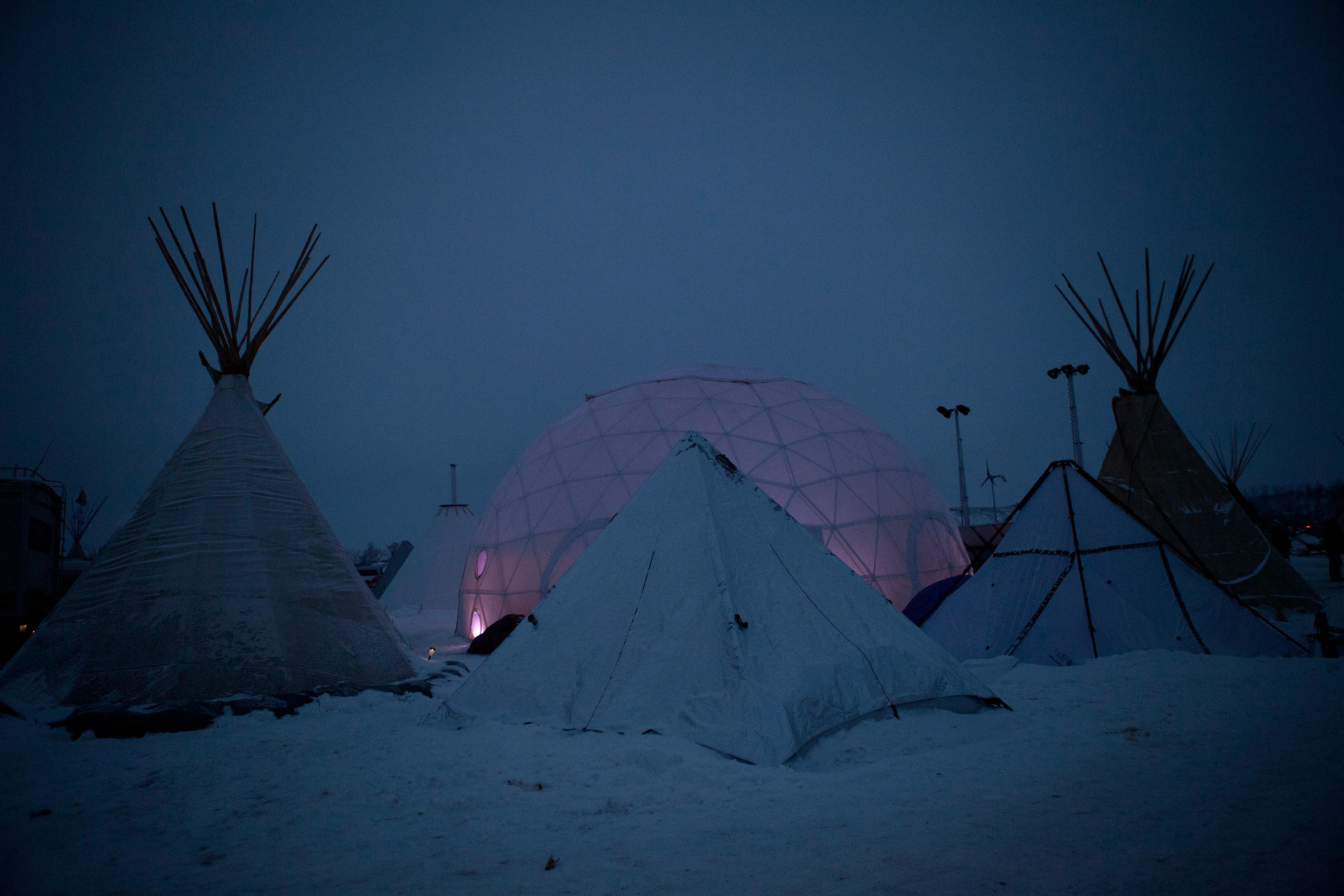 A geodesic dome, which was donated in October, now serves as a community gathering space. It is one of many structures that have been erected in the camp to prepare for the long winter ahead.