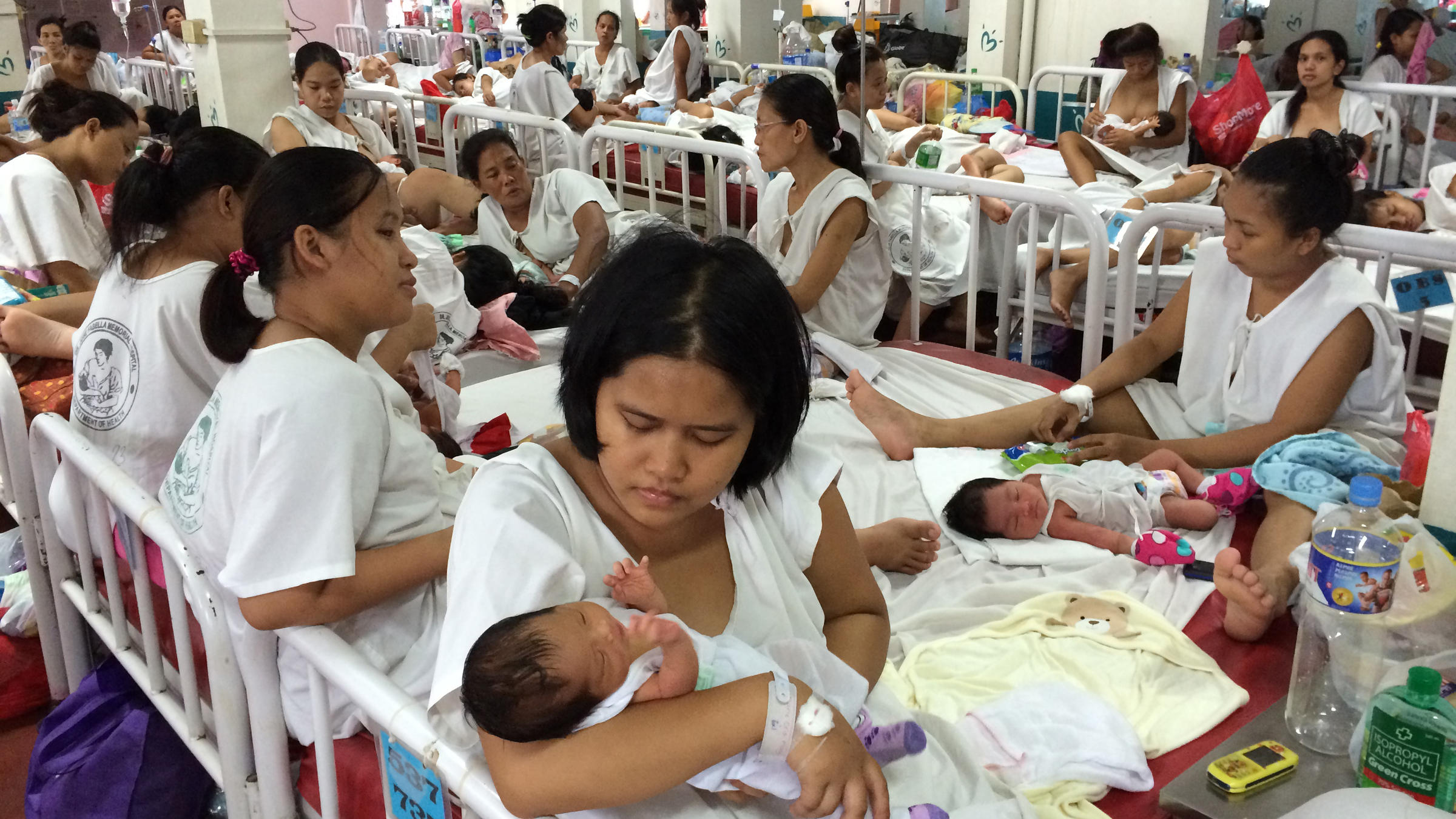 In this Manila 'baby factory,' why women put up with crowding four to a