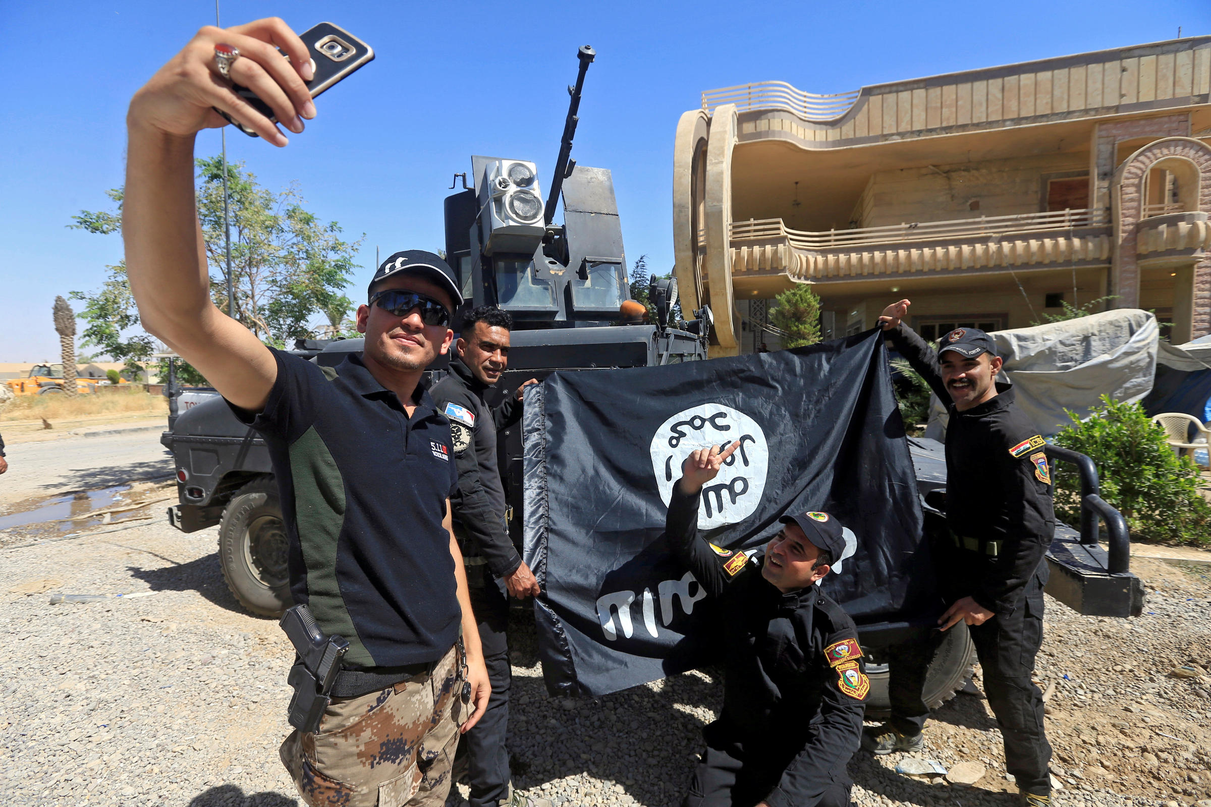 Iraqi retakes two Mosul neighborhoods from Islamic State