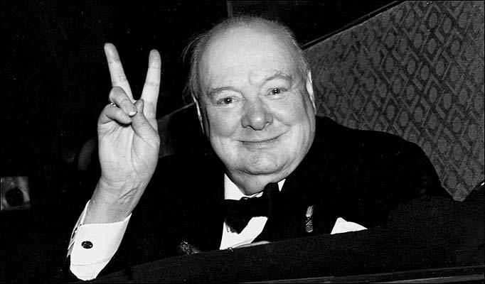 Winston Churchill giving a V for victory sign