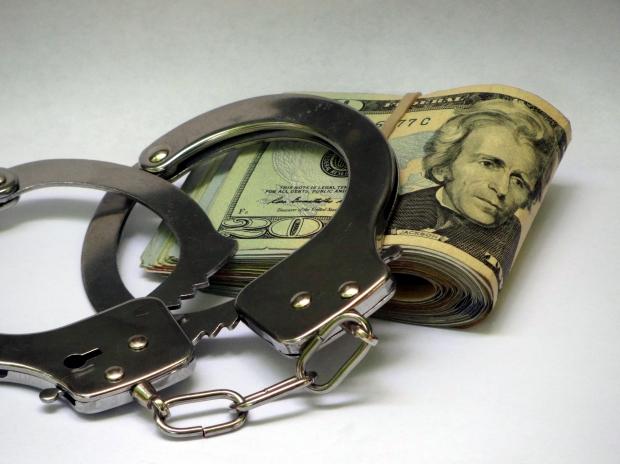 money_handcuffs.jpg