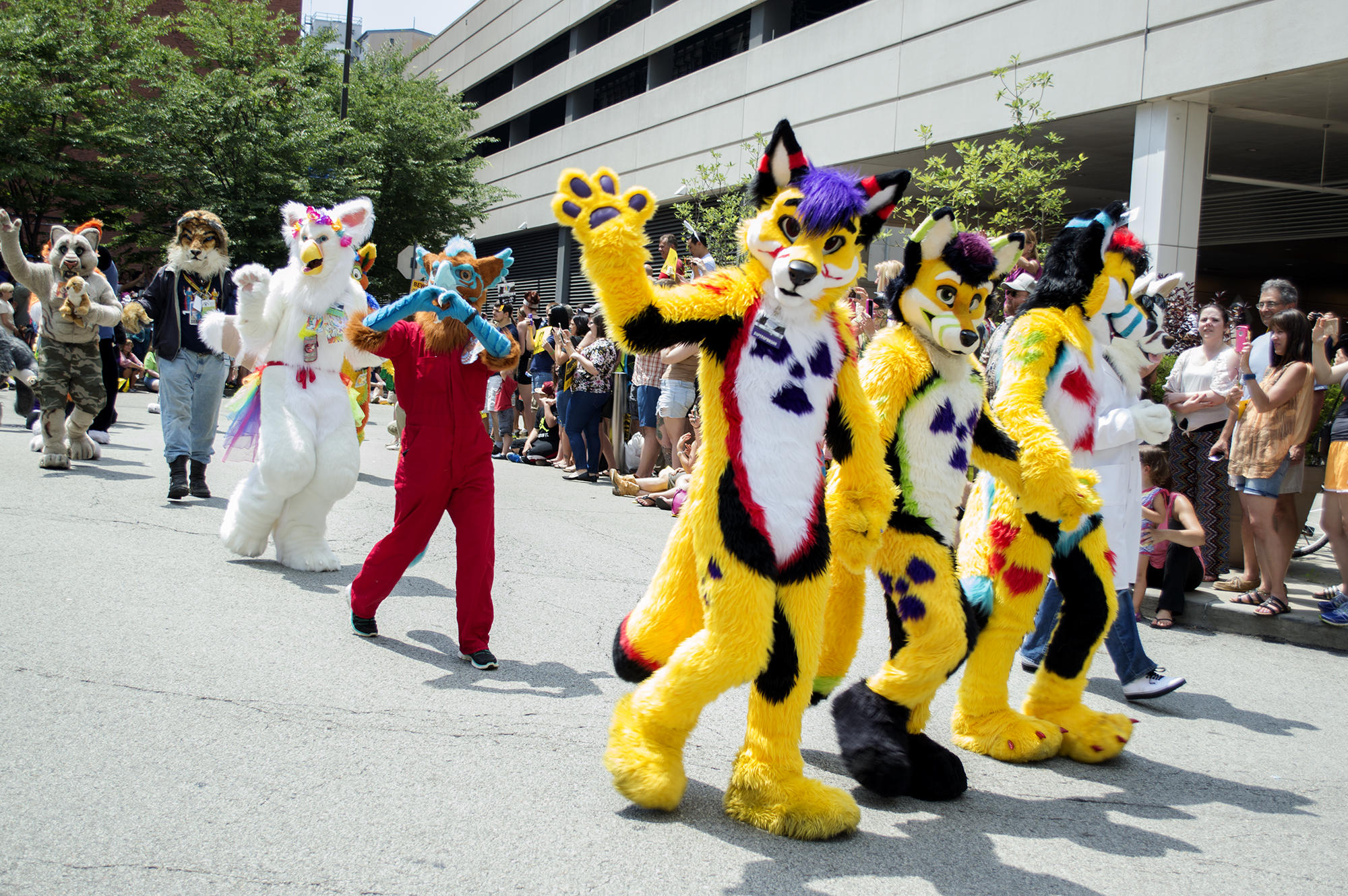 Photos Furries, And Their Fans, Frolic Downtown During Anthrocon 90.