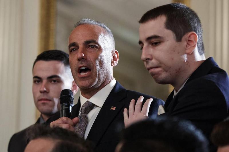 Andrew Pollack, father of slain Marjory Stoneman Douglas High School student Meadow Jade Pollack, joined by his sons, speaks during a listening session with President Donald Trump in February 2018.