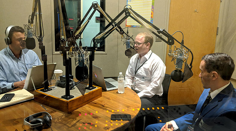Gavin Jackson (l) speaks with Jamie Lovegrove and Andy Brown (r) on Thursday, June 28, 2018.