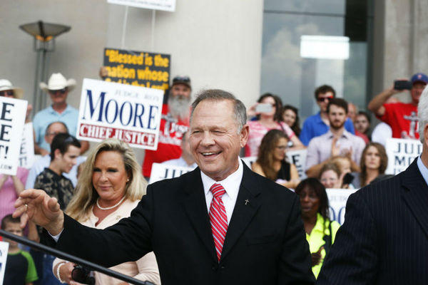 Alabama justice off bench for defying feds on gay marriage