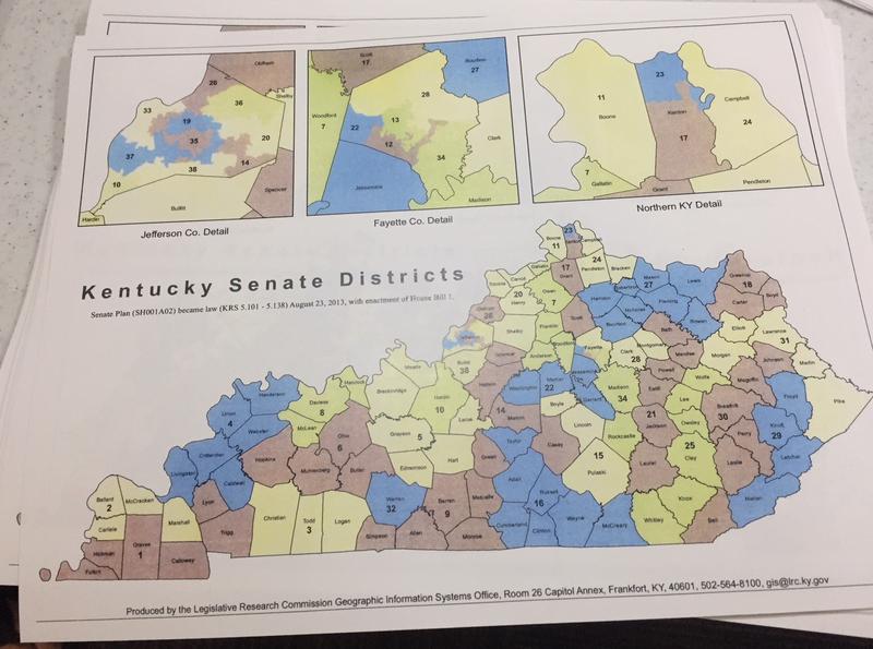 Maps of Kentucky Senate and House districts await attendees at the League of Women Voters of Kentucky's forum on redistricting and gerrymandering on Oct. 3, 2017.