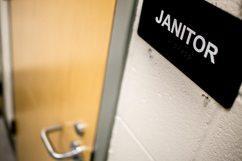 A sign indicates the janitor closet inside a Wake County public school.
