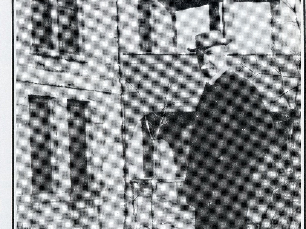 John H. Bothwell in front of the kitchen porch at the Bothwell Lodge in Sedalia, Missouri.