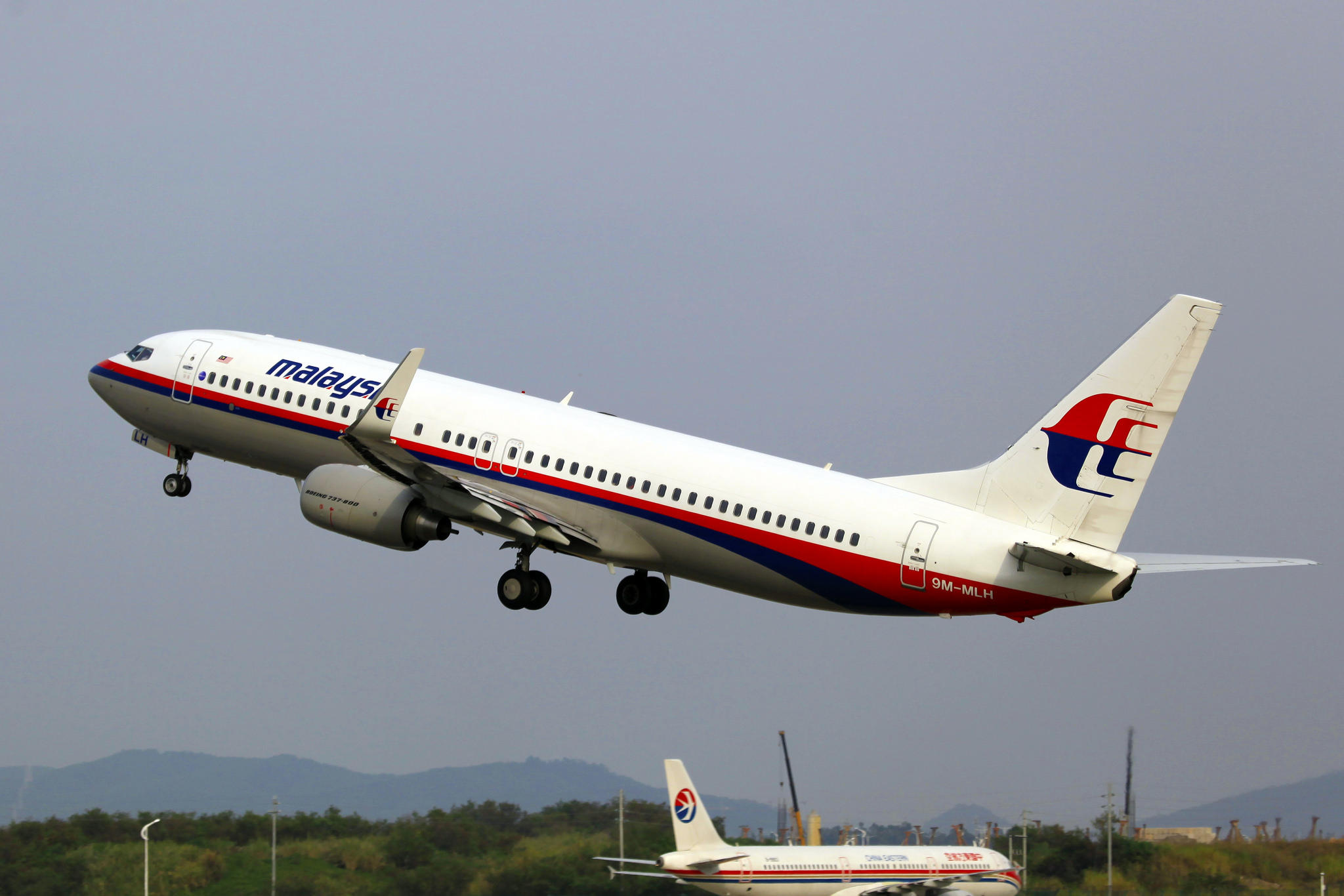 Pacific News Minute Search Ends for Flight MH370, Russia Blamed for