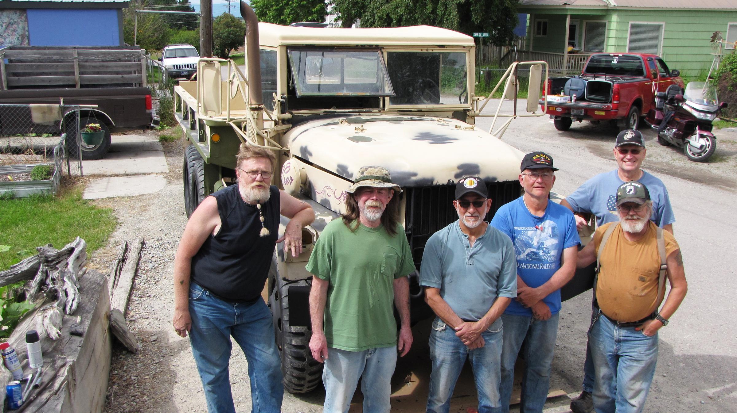 Vietnam veterans helping others out of the woods” MTPR