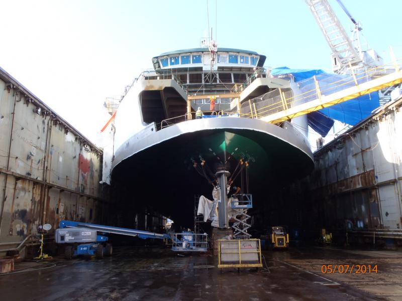 Crews prepare to paint the rudder on the M/V Samish in May of this year.