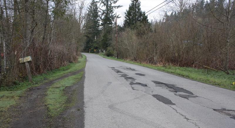 This county road between Maple Valley and Issaquah may not look like a major traffic corridor. But come rush hour, it's bumper to bumper on county roads like this as commuters seek out alternate routes to shave precious minutes off grueling commutes.