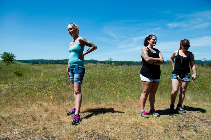 Washington Warrior Widows Founder Stephanie Groepper, left, stopped for a break alongside friend Amber Martini and new member Danielle Williams during a hike to Mima Mounds Natural Preserve.