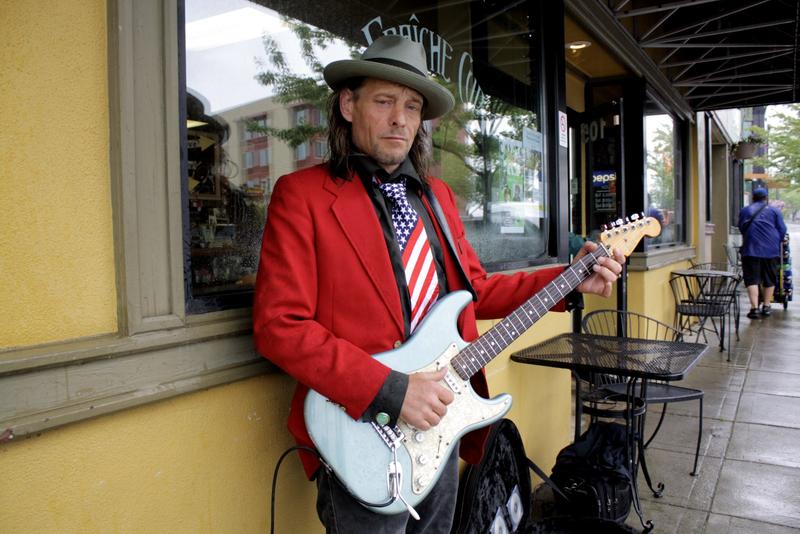 Kenny Wayne Gunner plays guitar in downtown Bremerton at lunch time