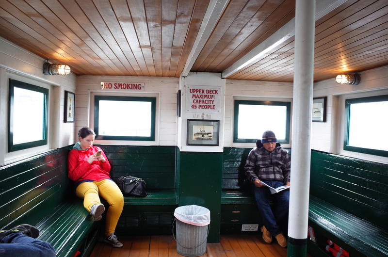 Passengers on Kitsap Transit's Port Orchard -Bremerton ferry. Soon a modern vessel will take on a new route - Bremerton to Seattle. 
