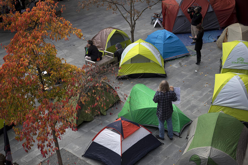 Tents are shown as people gathered to protest the sweeps of homeless camps in November, 2017, at City Hall in Seattle. 