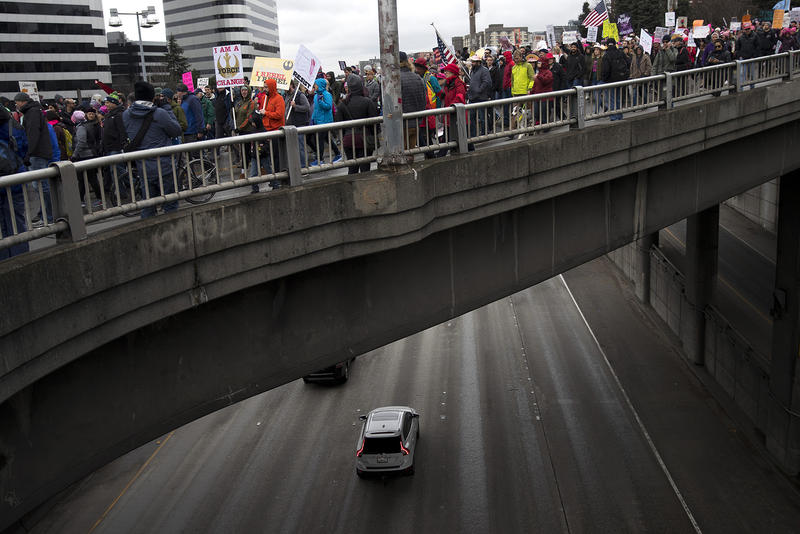 Thousdands march on Pine St. during the Women's March on Saturday, January 20, 2018, in Seattle. 