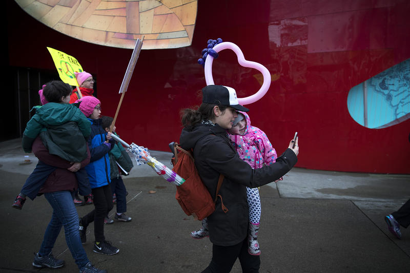 Lindsey Eason takes a selfie with her 4-year-old daughter Juniper Eason during the Women's March on Denny Way on Saturday, January 20, 2018, in Seattle. 