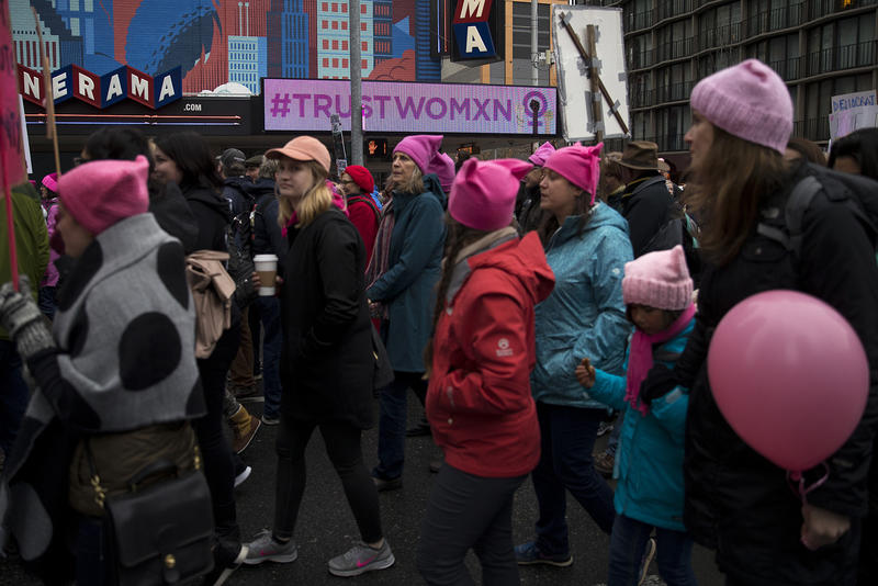 Crowds march on 4th Avenue during the Women's March on Saturday, January 20, 2018, in Seattle.