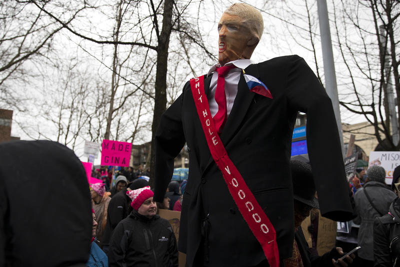 A puppet is carried on Pine St. during the Women's March  on Saturday, January 20, 2018, in Seattle. 