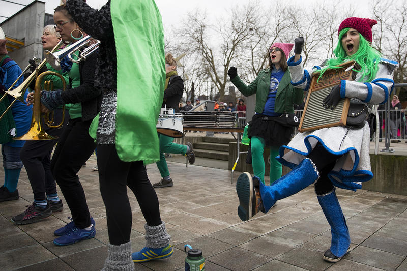 Forest Ember cheers while performing with the Filthy FemCorps after the Women's March on Saturday, January 20, 2018, at Seattle Center. 