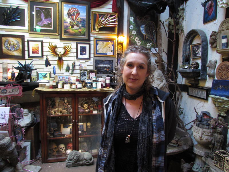 Gayle Nowicki owns Gargoyles Statuary in Seattle's University District. She says small businesses are already closing due to taxes and zoning changes.