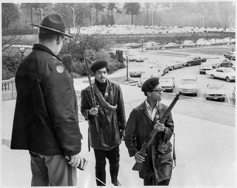 Seattle Black Panthers gather on the steps of the Capitol in Olympia on February 28, 1969, to protest a bill aiming to make it a crime to exhibit firearms with 'an intent to intimidate others.'