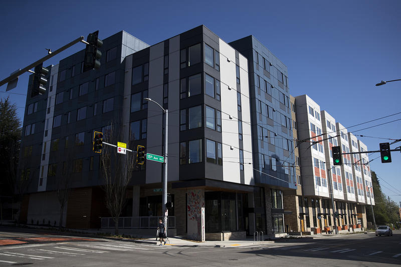 The newly constructed Arbora Court Apartments, with 133 units, is shown on Monday, April 23, 2018, in Seattle. Forty of the apartments have been set aside for families transitioning out of homelessness.