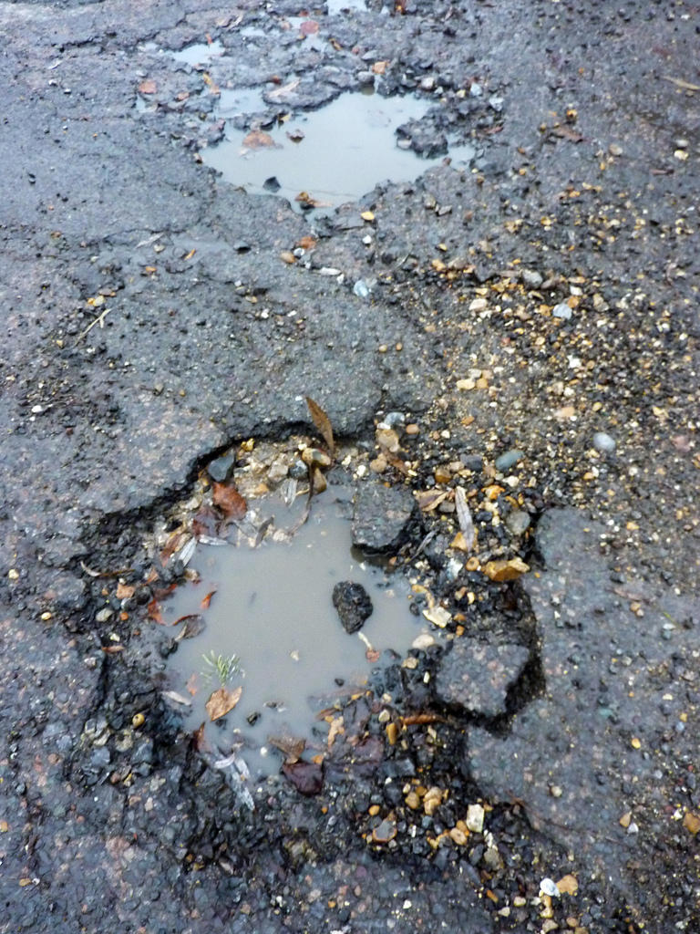 Macomb County roads riddled with dangerous potholes | Michigan Radio