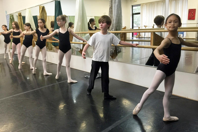 boy in ballet dress