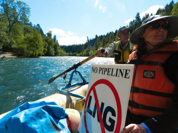 <p>"Hike the Pipe" supporters on Rogue River show opposition to the Jordan Cove liquefied natural gas project.</p>