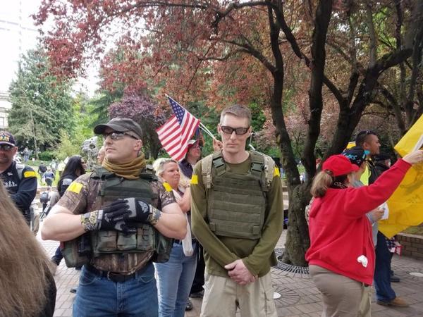 <p>Men acting as private security for the pro-Trump crowd at Sunday's rallies wore military-style attire, complete with body armor. Organizers of the event say these men volunteered their services.&nbsp;</p>