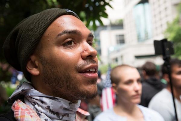 <p>Gregory McKelvey, the leader of Portland protest group Portland's Resistance, was among the crowd of counter-protesters who tried to engage the pro-Trump crowd Sunday, June 4, 2017. "This is what America is all about," he said of the opposing protests. "Both sides get to have their freedom of speech, both sides get to have their voices heard."</p>