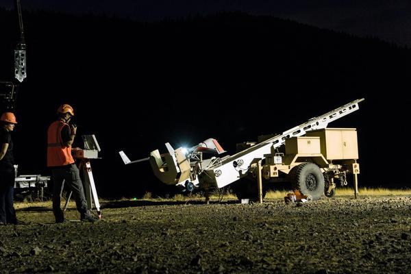 The roughly 45-pound ScanEagle reconnaissance drone rests on its catapult launcher on the banks of the Columbia River in Bingen shortly before launch on Sunday. 
