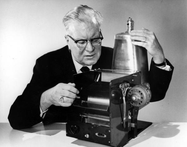 Chester Carlson demonstrates his original copying process in 1963.